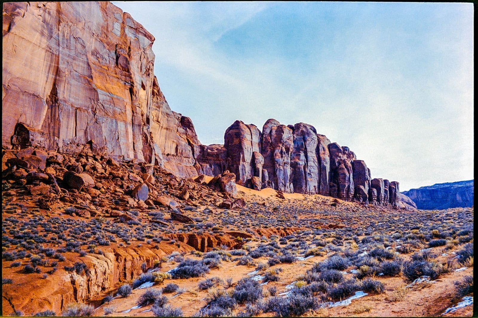 Navajo Landscape Color Art Print featuring red rock formations and golden desert light