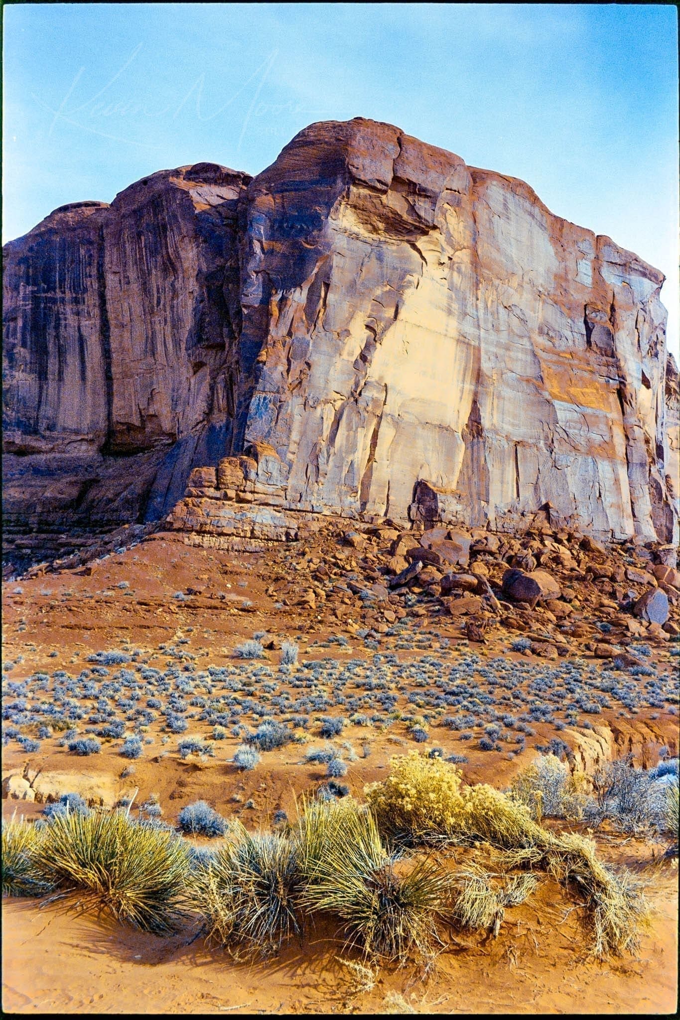 Iconic sandstone cliffs and rock formations in Monument Valley, Arizona.