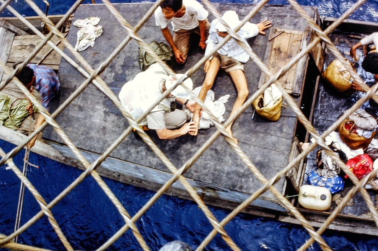Vietnamese refugee with a broken leg